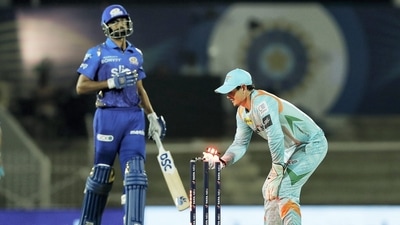 Quinton de Kock of Lucknow Super Giants runs out Jaydev Unadkat of Mumbai Indians, during the Indian Premier League 2022 (PTI)