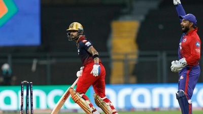 Mumbai: Virat Kohli of Royal Challengers Bangalore is run out by Lalit Yadav of Delhi Capitals during the Indian Premier League 2022 cricket match between Delhi Capitals and Royal Challengers Bangalore, at the Wankhede Stadium, in Mumbai, Saturday, April 16, 2022. (Sportzpics/PTI Photo) (PTI04_16_2022_000263B) (PTI) Mumbai: Virat Kohli of Royal Challengers Bangalore is run out by Lalit Yadav of Delhi Capitals during the Indian Premier League 2022 cricket match between Delhi Capitals and Royal Challengers Bangalore, at the Wankhede Stadium, in Mumbai, Saturday, April 16, 2022. (Sportzpics/PTI Photo) (PTI04_16_2022_000263B) (PTI)