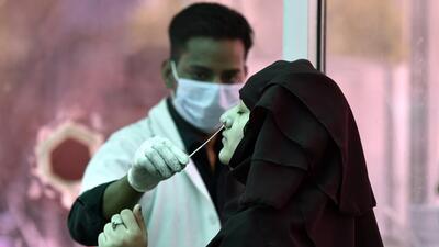 A health worker collects a swab sample for Covid-19 test at the District Hospital at Sector 30 in Noida on Saturday. (Sunil Ghosh/ HT) A health worker collects a swab sample for Covid-19 test at the District Hospital at Sector 30 in Noida on Saturday. (Sunil Ghosh/ HT)