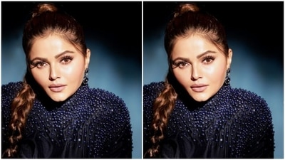 Rubina’s black gown came with turtleneck and embellishments in blue stones around the shoulders and the sleeves. Her full-sleeved body-hugging gown came with one thigh-high slit and a train. (Instagram/@rubinadilaik)