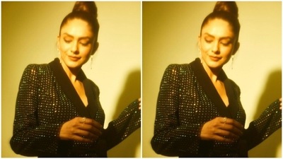 Mrunal played muse to fashion designer houses RSVP and Nikhil Thampi and picked a black sequined co-ord set for the party. (Instagram/@mrunalthakur)