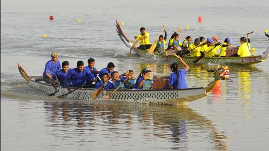 Participants of the dragon race on the inaugural day of the sports carnival for persons on wheelchairs at Sukhna Lake, in Chandigarh on Saturday. (Keshav Singh/HT)