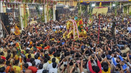 The 15-day Chithirai festival, which commenced on April 5 at the renowned Sri Meenakshi Sundareshwarar temple, saw lakhs of devotees crowding the Vaigai river bank from 4 am Saturday to watch the grand entry of Lord Kallazhagar into the river. (PTI)