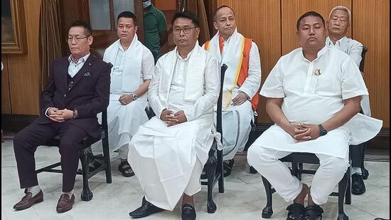 The newly inducted ministers who took oath at the Raj Bhawan in Imphal are Letpao Haokip, Dr Sapam Rajan, Leishengthem Susindro, Heikham Dingo, Thounaojam Basanta and Khasim Vashum. (HT PHOTO.)