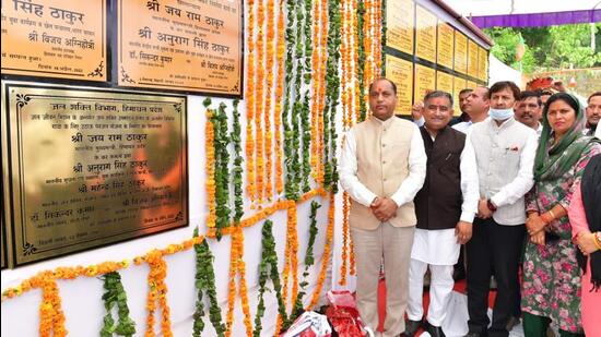 Himachal Pradesh chief minister Jai Ram Thakur inaugurating development projects in Nadaun assembly constituency of Hamirpur on Saturday. (HT Photo)