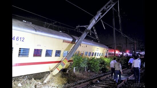 Three coaches of Puducherry Express derailed at Matunga station, in Mumbai on Friday night, April 15, 2022. (PTI)