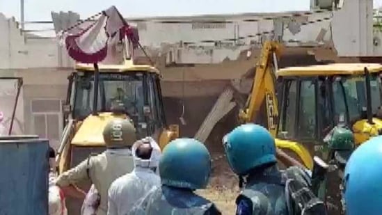 Khargone administration demolishing the properties of the accused in communal clashes during the Ram Navami procession.(ANI)