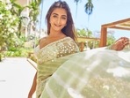 Pooja Hegde cuts romantic, flirtatious silhouette in backless sheer green saree (Instagram/hegdepooja) Pooja Hegde cuts romantic, flirtatious silhouette in backless sheer green saree (Instagram/hegdepooja)