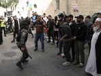 Israeli police clashed with Palestinians outside Al-Aqsa Mosque after police cleared Palestinians from the sprawling compound to facilitate the routine visit of Jews to the holy site. (AP Photo/Mahmoud Illean)(AP) Israeli police clashed with Palestinians outside Al-Aqsa Mosque after police cleared Palestinians from the sprawling compound to facilitate the routine visit of Jews to the holy site. (AP Photo/Mahmoud Illean)(AP)
