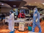 Covid-19 patients undergo treatment inside the Shehnai Banquet Hall, a Covid-19 care facility, in New Delhi.(PTI) Covid-19 patients undergo treatment inside the Shehnai Banquet Hall, a Covid-19 care facility, in New Delhi.(PTI)