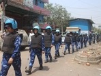 Rapid Action Force personnel patrol after violent clashes between two communities at Jahangirpuri in New Delhi,.(PTI) Rapid Action Force personnel patrol after violent clashes between two communities at Jahangirpuri in New Delhi,.(PTI)