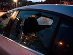 A car window is shot out in the wake of a fatal shooting on Pittsburgh's North Side, Sunday Pittsburgh police said in a release that the shooting happened around 12:30 a.m. at a short-term rental property with more than 200 people inside.(AP) A car window is shot out in the wake of a fatal shooting on Pittsburgh's North Side, Sunday Pittsburgh police said in a release that the shooting happened around 12:30 a.m. at a short-term rental property with more than 200 people inside.(AP)
