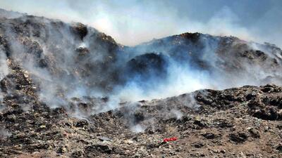 Fire broke out in a main dumping site of MC at Tajpur road in Ludhiana on April 17, 2022. (Harvinder Singh/HT)