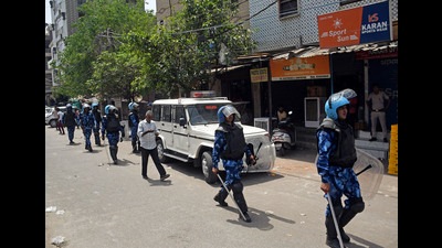 Rapid Action Force (RAF) personnel patrol the site where violence broke out between two communities, Jahangirpuri, New Delhi, on Sunday (Ishant Kumar) Rapid Action Force (RAF) personnel patrol the site where violence broke out between two communities, Jahangirpuri, New Delhi, on Sunday (Ishant Kumar)