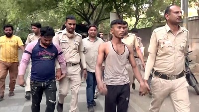 Police personnel taking the accused in the Jahangirpuri violence case to Rohini court in New Delhi on Sunday. (ANI ) Police personnel taking the accused in the Jahangirpuri violence case to Rohini court in New Delhi on Sunday. (ANI )