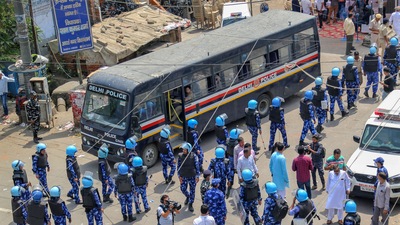 Rapid Action Force personnel keep vigil after clashes broke out between two communities during a Hanuman Jayanti procession on Saturday, at Jahangirpuri in New Delhi, Sunday, April 17, 2022. (PTI Photo)