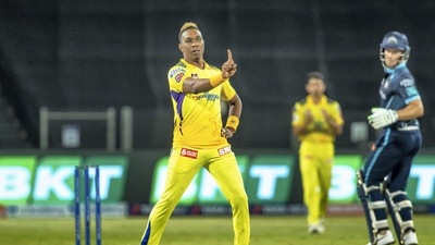 Pune: Dwayne Bravo of Chennai Super Kings celebrates the wicket of Rahul Tewatia of Gujarat Titans, during the Indian Premier League 2022 cricket match between Gujarat Titans and Chennai Super Kings, at the MCA International Stadium, in Pune, Sunday, April 17, 2022. (Sportzpics/PTI Photo)(PTI04_17_2022_000234B) (PTI) Pune: Dwayne Bravo of Chennai Super Kings celebrates the wicket of Rahul Tewatia of Gujarat Titans, during the Indian Premier League 2022 cricket match between Gujarat Titans and Chennai Super Kings, at the MCA International Stadium, in Pune, Sunday, April 17, 2022. (Sportzpics/PTI Photo)(PTI04_17_2022_000234B) (PTI)