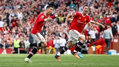 Soccer Football - Premier League - Manchester United v Norwich City - Old Trafford, Manchester, Britain - April 16, 2022 Manchester United's Cristiano Ronaldo celebrates scoring their third goal with Nemanja Matic REUTERS (REUTERS)