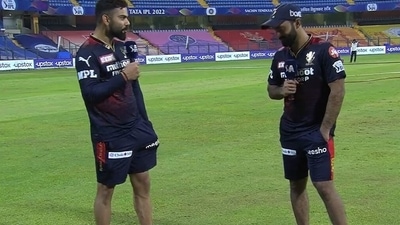 Virat Kohli and Dinesh Karthik (iplt20.com grab) Virat Kohli and Dinesh Karthik (iplt20.com grab)