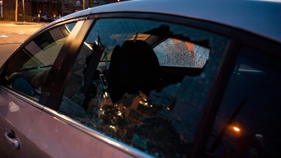 A car window is shot out in the wake of a fatal shooting on Pittsburgh's North Side, Sunday Pittsburgh police said in a release that the shooting happened around 12:30 a.m. at a short-term rental property with more than 200 people inside.(AP)