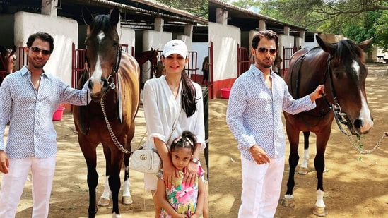 Anupam Mittal, his wife Aanchal Kumar and their daughter Alysaa pose with a horse.