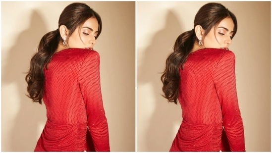 Rakul Preet’s dress came intricately decorated in red beads and a folded detail at the waist. The full sleeves and the pleated detail near to the shoulder added more oomph to the attire.(Instagram/@rakulpreet)