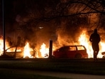 Cars are engulfed by flames after protests broke out at Rosengard in Malmo, Sweden.(AP) Cars are engulfed by flames after protests broke out at Rosengard in Malmo, Sweden.(AP)