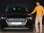 Mahesh Babu posing with an Audi e-tron car. Mahesh Babu posing with an Audi e-tron car.