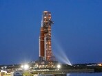 The NASA Artemis rocket with the Orion spacecraft aboard leaves the Vehicle Assembly Building moving slowly on an 11-hour journey to pad 39B at the Kennedy Space Center in Cape Canaveral.(AP)