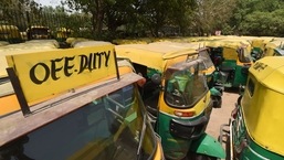 Autos stand parked during a strike by auto and taxi unions, in New Delhi.