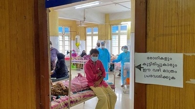 A man looks out from a Covid ward at a hospital in Manjeri, Kerala. (REUTERS file)