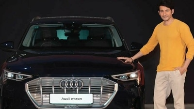 Mahesh Babu posing with an Audi e-tron car. Mahesh Babu posing with an Audi e-tron car.