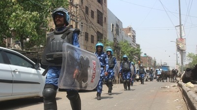 New Delhi: Rapid Action Force personnel patrol after violent clashes between two communities during a Hanuman Jayanti procession. (PTI) New Delhi: Rapid Action Force personnel patrol after violent clashes between two communities during a Hanuman Jayanti procession. (PTI)