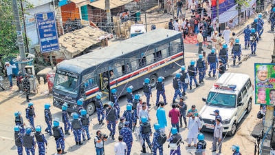 Rapid Action Force personnel at Jahangirpuri. (PTI) Rapid Action Force personnel at Jahangirpuri. (PTI)