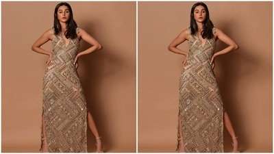 Shibani’s sleeveless gown featured a midriff-baring neckline, intricate work in silver and golden resham threads and mirrors, and tassels at her shoulders. (Instagram/@shibanidandekar)