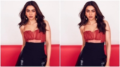 Rakul Preet accessorised her look for the day with golden hoop earrings from the shelves of Eurumme Jewellery and ring from Fasaana Jewels. (Instagram/@rakulpreet)