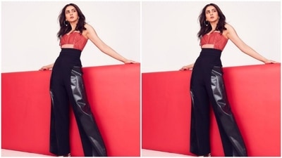 Styled by fashion stylist Anshika Verma, Rakul Preet wore her tresses open in wavy curls with a middle part. (Instagram/@rakulpreet)