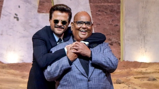 Bollywood actors Anil Kapoor and Satish Kaushik during an event for the trailer launch of their upcoming Netflix film Thar, in Mumbai,(PTI)