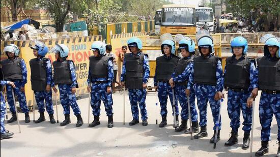Security personnel deployed after the violence during a Hanuman Jayanti procession in Delhi's Jahangirpuri area on Saturday, in Jahangirpuri in New Delhi on Monday. (HT PHOTO.)
