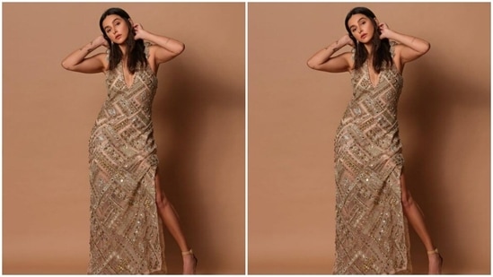 Shibani posed like a diva in the two thigh high slits of the gown. She also opted for nude stilettos to complete her look.(Instagram/@shibanidandekar)