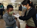 A person gets a dose of Covid-19 vaccine at the district hospital in Noida on Sunday. (HT file) A person gets a dose of Covid-19 vaccine at the district hospital in Noida on Sunday. (HT file)