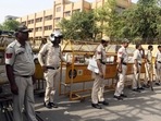 New Delhi, Apr 18 (ANI): Police personnel stand guard at a site where the Delhi Police Crime Branch team members were targeted on Monday.&nbsp;