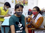A beneficiary reacts while receiving a dose of Covid-19 vaccine during a vaccination drive for the 12-14 years of age group at a dispensary Daryaganj in New Delhi on Tuesday. (ANI ) A beneficiary reacts while receiving a dose of Covid-19 vaccine during a vaccination drive for the 12-14 years of age group at a dispensary Daryaganj in New Delhi on Tuesday. (ANI )