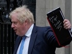 Britain's Prime Minister Boris Johnson waves to the media as he leaves 10 Downing Street for the House of Commons in London on Tuesday.(AP) Britain's Prime Minister Boris Johnson waves to the media as he leaves 10 Downing Street for the House of Commons in London on Tuesday.(AP)