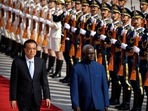 Chinese Premier Li Keqiang, left, and Solomon Islands Prime Minister Manasseh Sogavare review an honor guard during a welcome ceremony at the Great Hall of the People in Beijing, Wednesday, Oct. 9, 2019. (AP Photo/Mark Schiefelbein, File)(AP) Chinese Premier Li Keqiang, left, and Solomon Islands Prime Minister Manasseh Sogavare review an honor guard during a welcome ceremony at the Great Hall of the People in Beijing, Wednesday, Oct. 9, 2019. (AP Photo/Mark Schiefelbein, File)(AP)