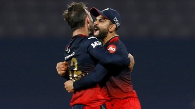 Glenn Maxwell of Royal Challengers Bangalore celebrates with teammate Virat Kohli after the wicket of Krunal Pandya of Lucknow Super Giants (IPL) Glenn Maxwell of Royal Challengers Bangalore celebrates with teammate Virat Kohli after the wicket of Krunal Pandya of Lucknow Super Giants (IPL)