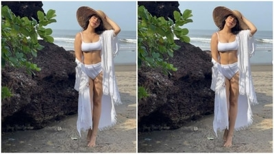 Neha Sharma earlier set the internet ablaze with her beach vacation pictures in a white swimsuit teamed with a cape and a sunhat.&nbsp; (Instagram/@nehasharmaofficial)