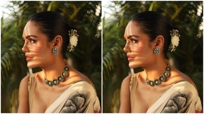 Esha’s chiffon saree came intricately detailed in red, green and black floral patterns. She paired it with a midriff-baring golden sequined sleeveless blouse. (Instagram/@egupta)