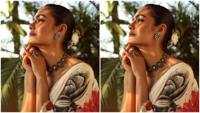 Esha decked up in nude eyeshadow, black winged eyeliner, mascara-laden eyelashes, drawn eyebrows, contoured cheeks and a shade of nude lipstick. (Instagram/@chandiniw)