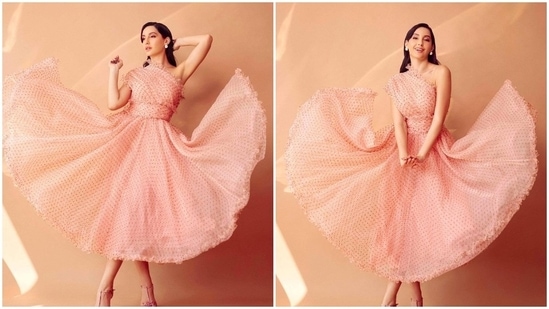 For the launch event of the show Dance Deewane Junior, Nora Fatehi wore a pretty pink one-shoulder organza dress by the designer duo Gauri &amp; Nainika.(Instagram/@norafatehi)